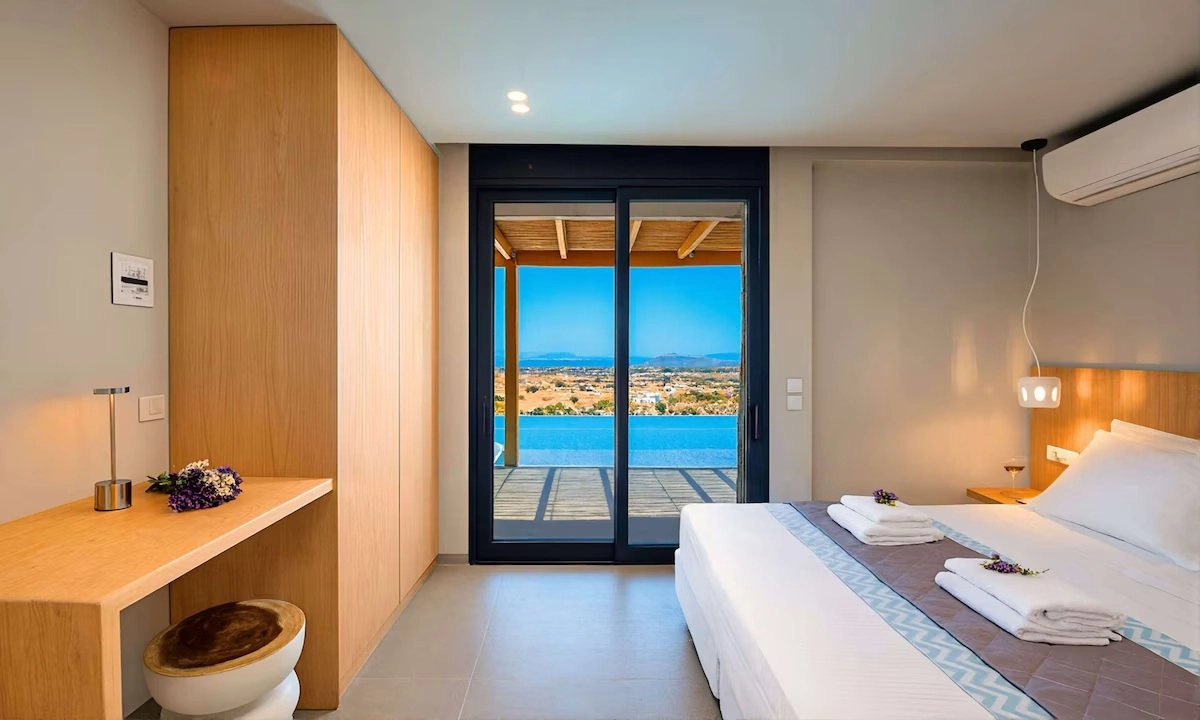 Bedroom with view outside during morning