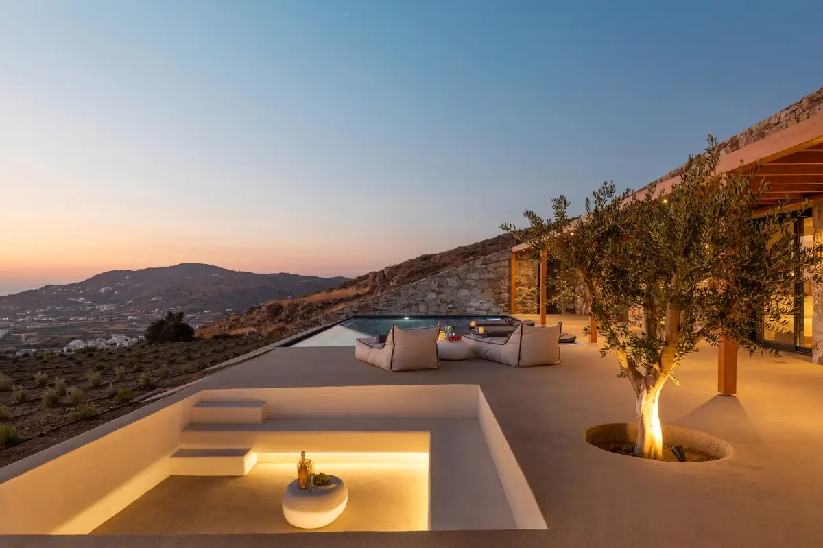 Villa exterior during sunset overlooking the entire common area