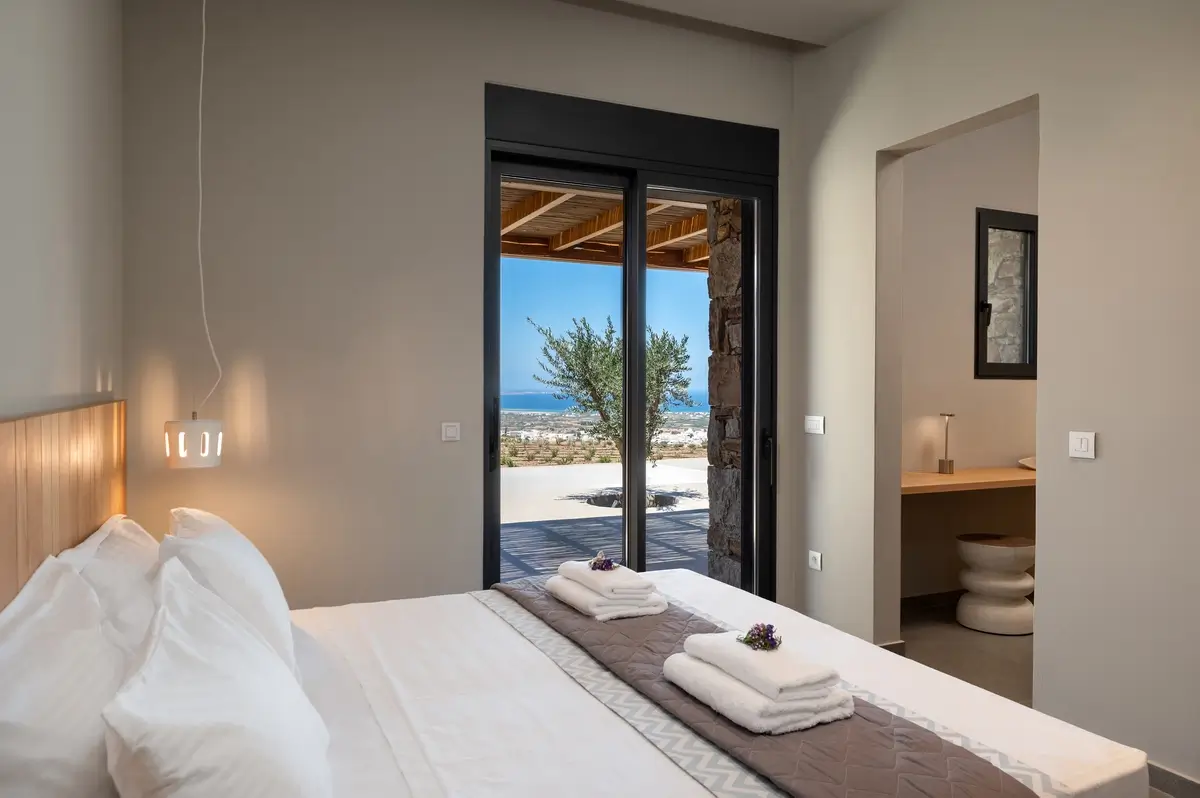 Nanny's bedroom with view to outside pool